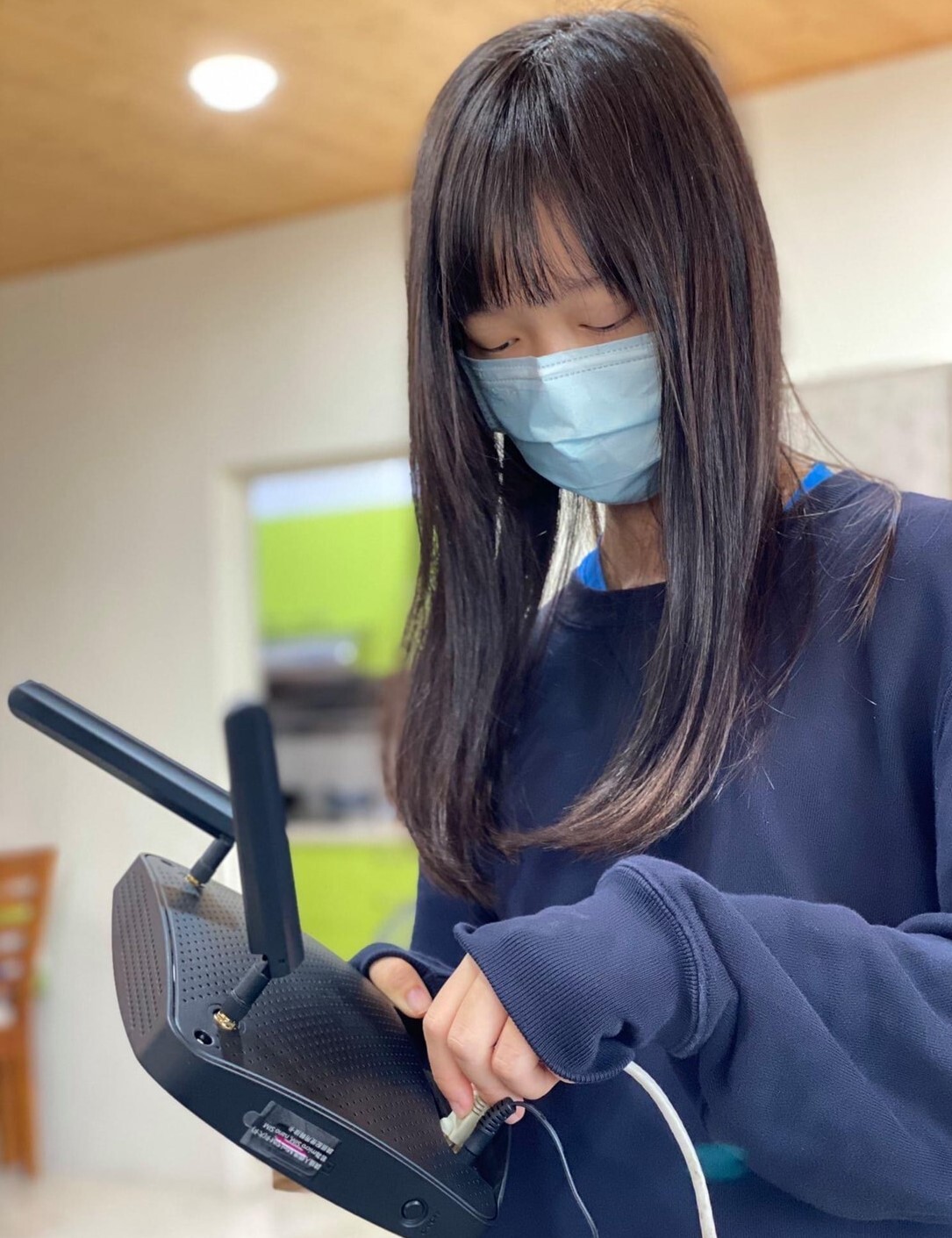 邱宥蓁同學學習WiFi數據機安裝與後續維護
