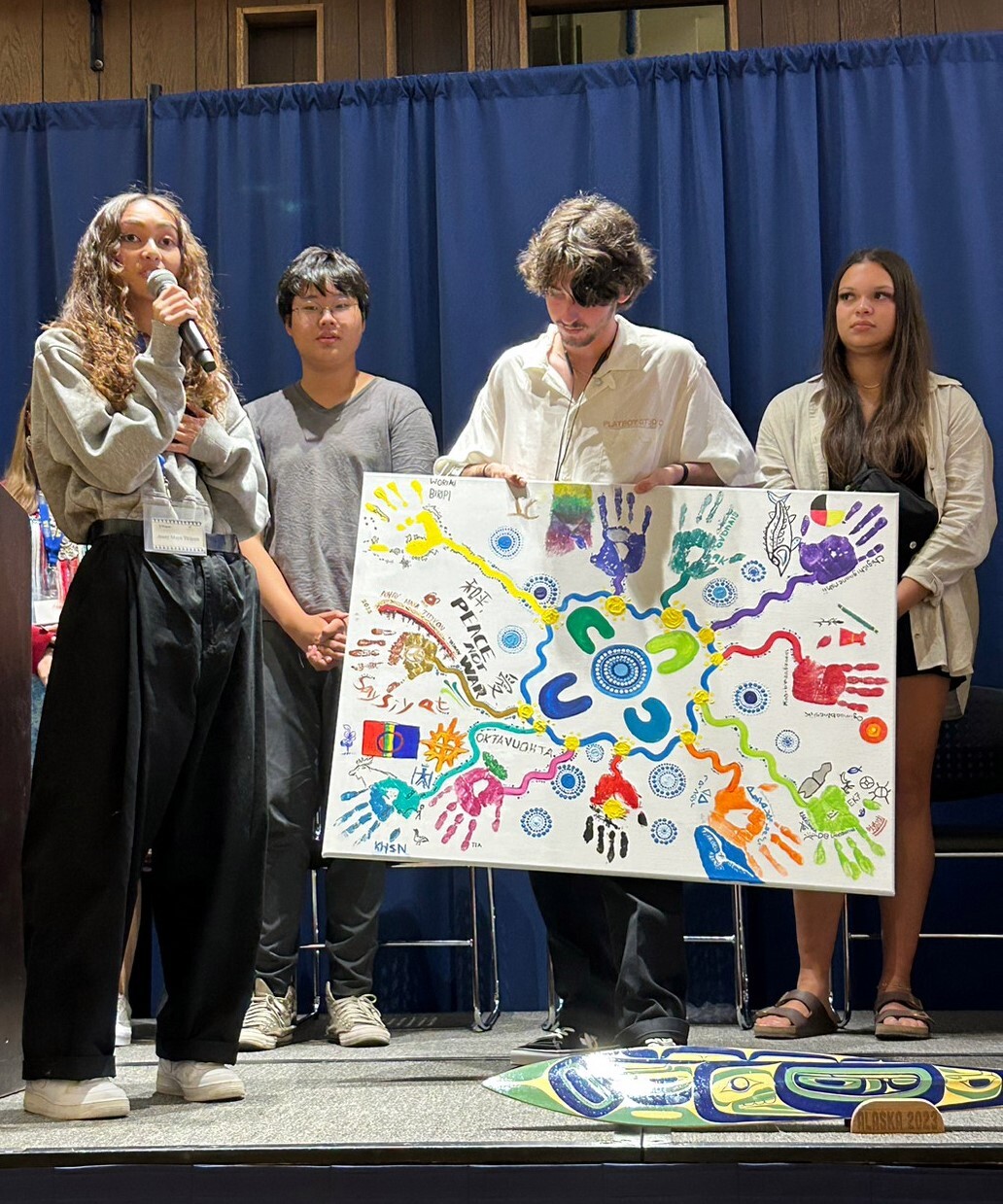 Away Maya Titiyon participated in Global Indigenous Youth Alliance and presented their collaborative art work to WINHEC AGM