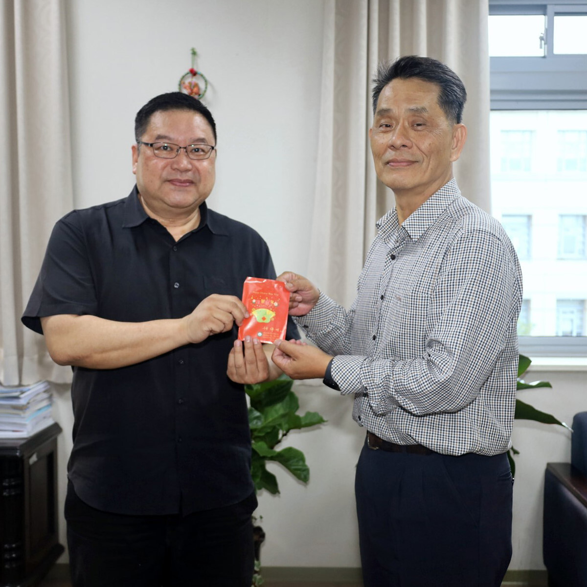 校長與廖慶華主任秘書合照